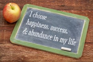 Writing affirmation: “I choose happiness, success, & abundance in my life.”