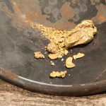 real california gold nuggets in a gold pan