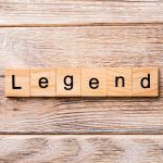 Wooden Scrabble-style blocks spelling the word legend