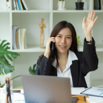 smiling woman on the phone waves as your backup