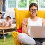 Working mom focused on writing while partner takes care of child