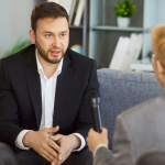 one business person interviews a man